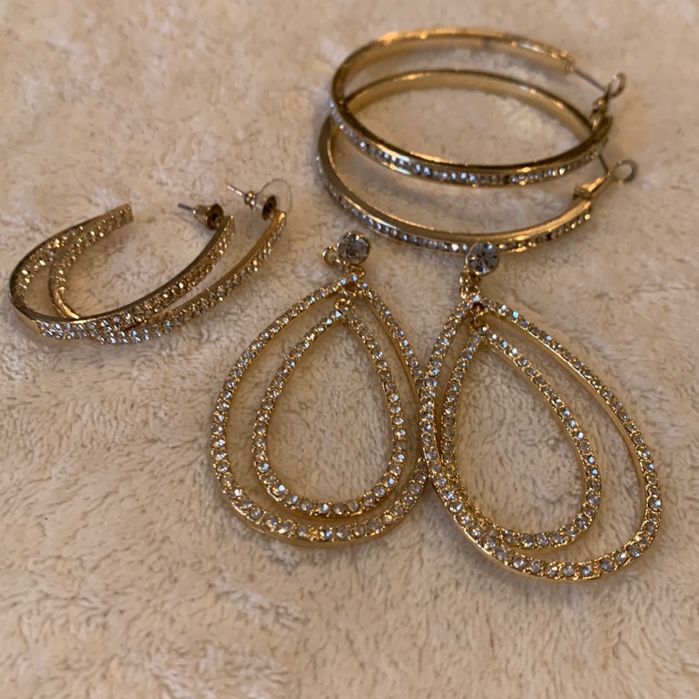Set of three gold and white stoned earrings